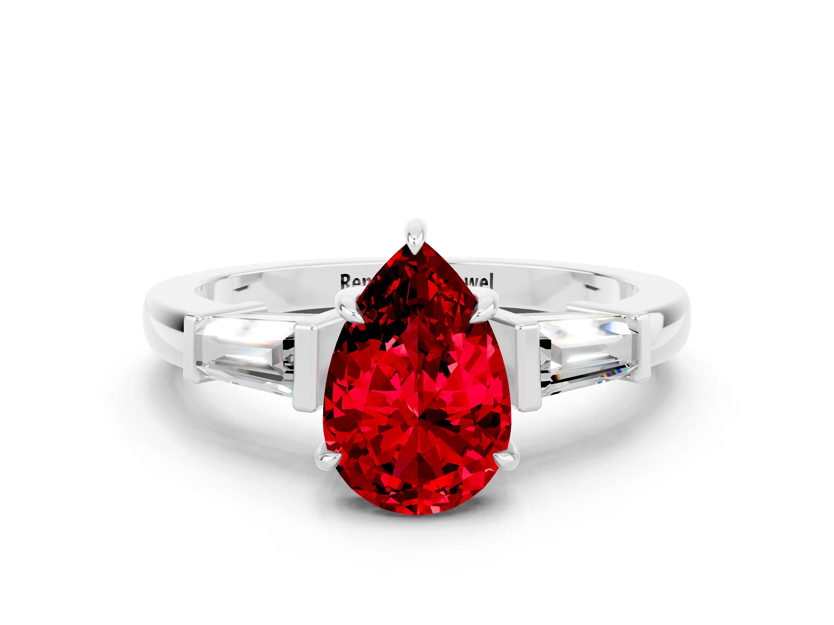 White gold Pear Cut Cut Diamond Ring with Tapered Baguette Side Stones in Four-Prong Setting
