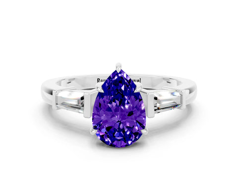 White gold Pear Cut Cut Diamond Ring with Tapered Baguette Side Stones in Four-Prong Setting