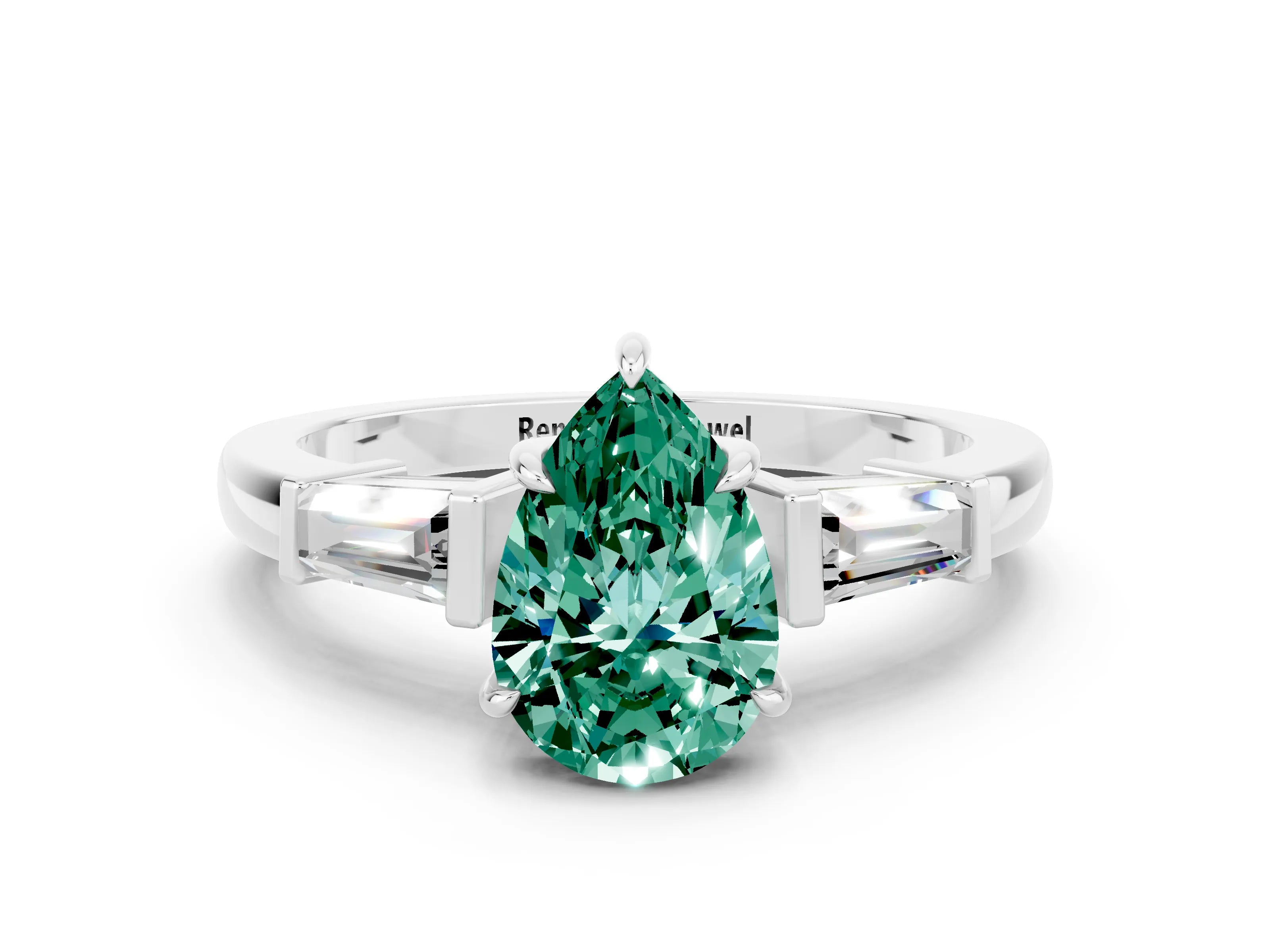 White gold Pear Cut Cut Diamond Ring with Tapered Baguette Side Stones in Four-Prong Setting