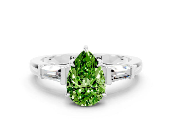 Silver Pear Cut Cut Diamond Ring with Tapered Baguette Side Stones in Four-Prong Setting