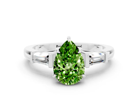 White gold Pear Cut Cut Diamond Ring with Tapered Baguette Side Stones in Four-Prong Setting