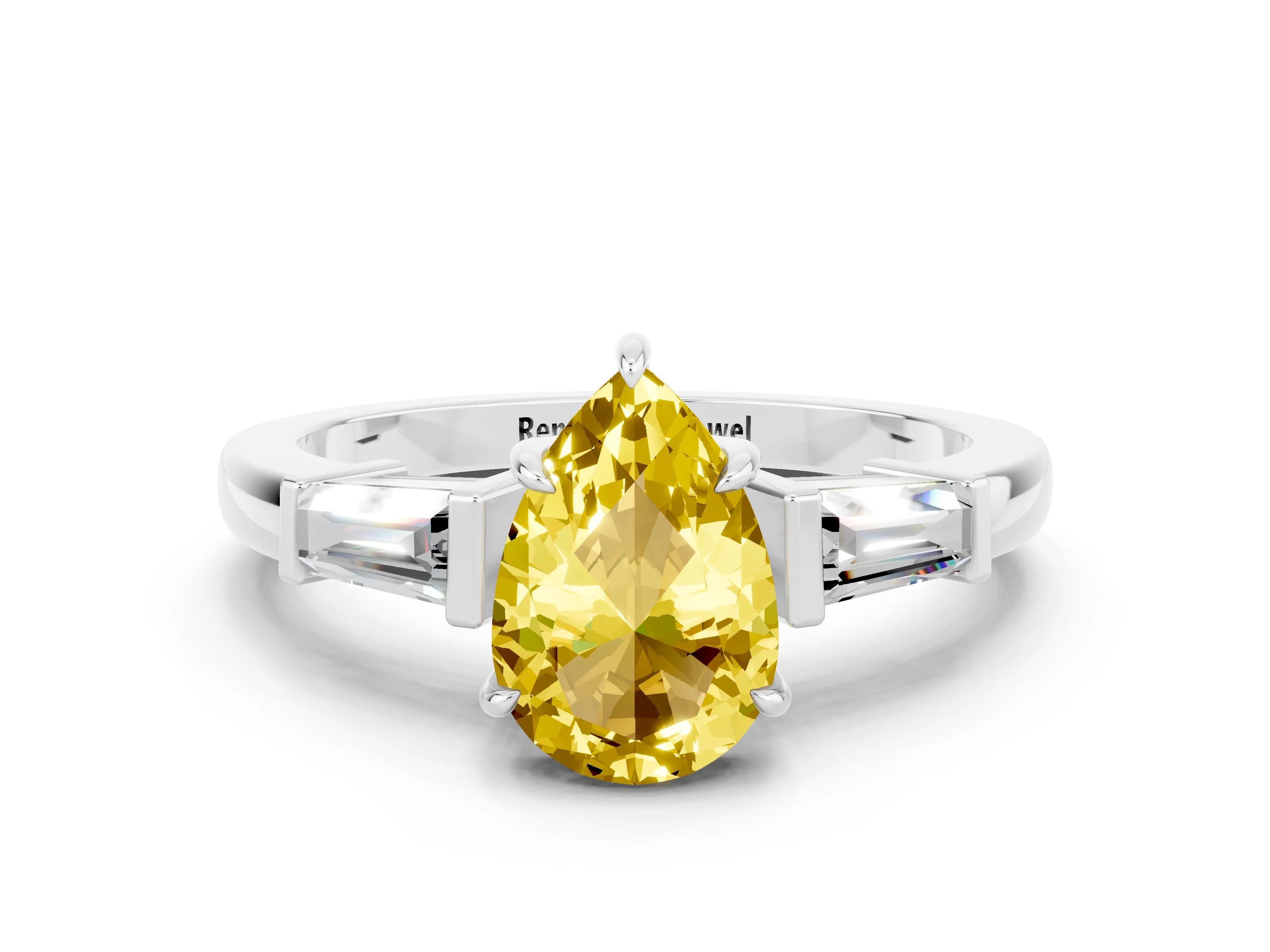 White gold Pear Cut Cut Diamond Ring with Tapered Baguette Side Stones in Four-Prong Setting