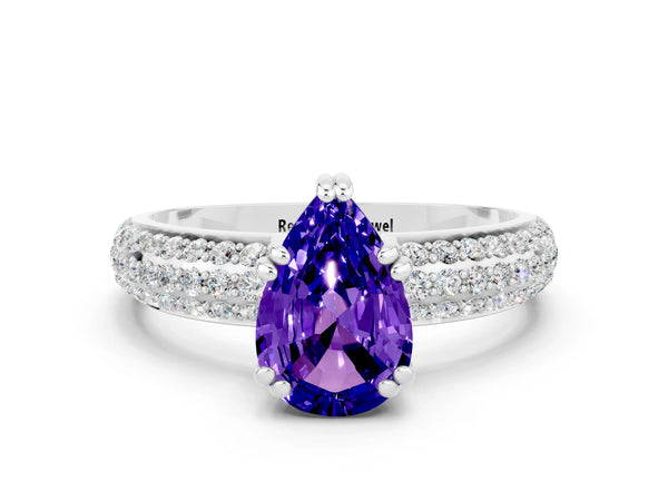 Silver Pear Cut Tanzanite Solitaire Ring with Multi-Row Round Pavé Band and Prong Setting