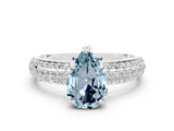 White gold Pear Cut Cut Pave Diamond Engagement Ring with Channel Set Band and Four-Prong Setting