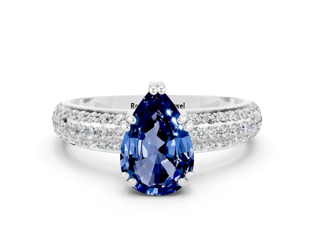 White gold Pear Cut Cut Pave Diamond Engagement Ring with Channel Set Band and Four-Prong Setting