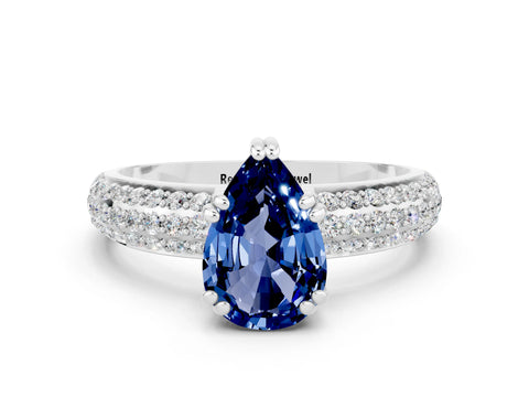 White gold Pear Cut Cut Pave Diamond Engagement Ring with Channel Set Band and Four-Prong Setting