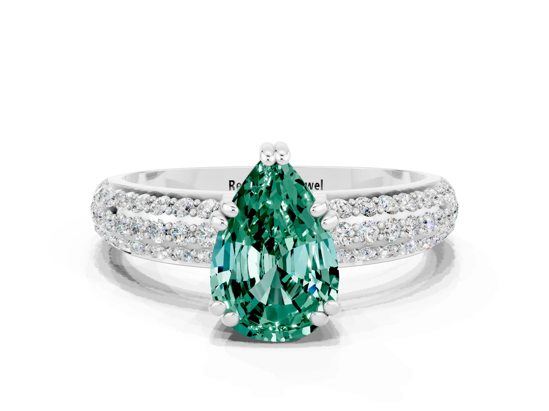 White gold Pear Cut Cut Pave Diamond Engagement Ring with Channel Set Band and Four-Prong Setting