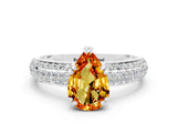 White gold Pear Cut Cut Pave Diamond Engagement Ring with Channel Set Band and Four-Prong Setting
