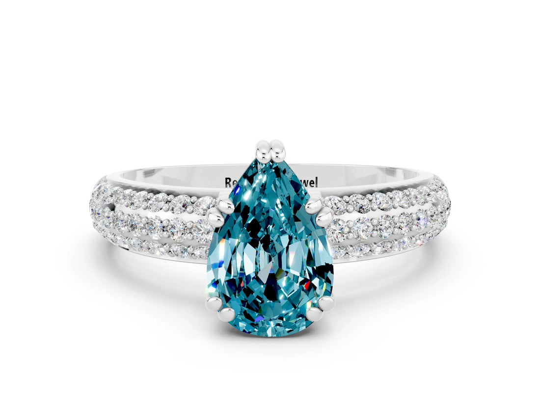 White gold Pear Cut Cut Pave Diamond Engagement Ring with Channel Set Band and Four-Prong Setting