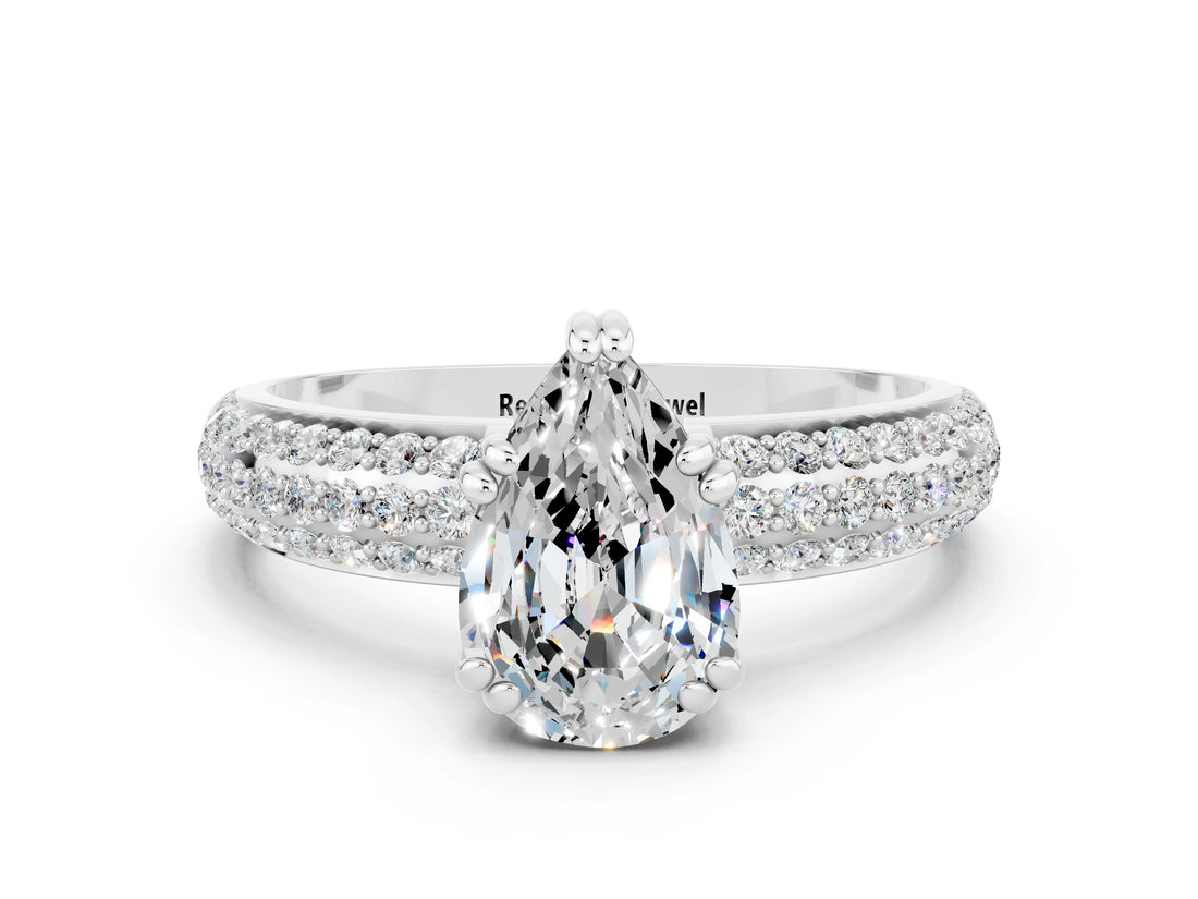 White gold Pear Cut Cut Pave Diamond Engagement Ring with Channel Set Band and Four-Prong Setting