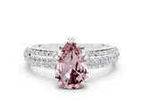 White gold Pear Cut Cut Pave Diamond Engagement Ring with Channel Set Band and Four-Prong Setting