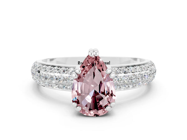 Platinum Pear Cut Cut Pave Diamond Engagement Ring with Channel Set Band and Four-Prong Setting