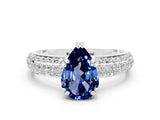 White gold Pear Cut Cut Pave Diamond Engagement Ring with Channel Set Band and Four-Prong Setting