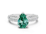 White gold Pear Cut Cut Pave Diamond Engagement Ring with Channel Set Band and Four-Prong Setting