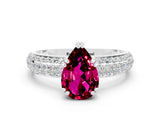 White gold Pear Cut Cut Pave Diamond Engagement Ring with Channel Set Band and Four-Prong Setting