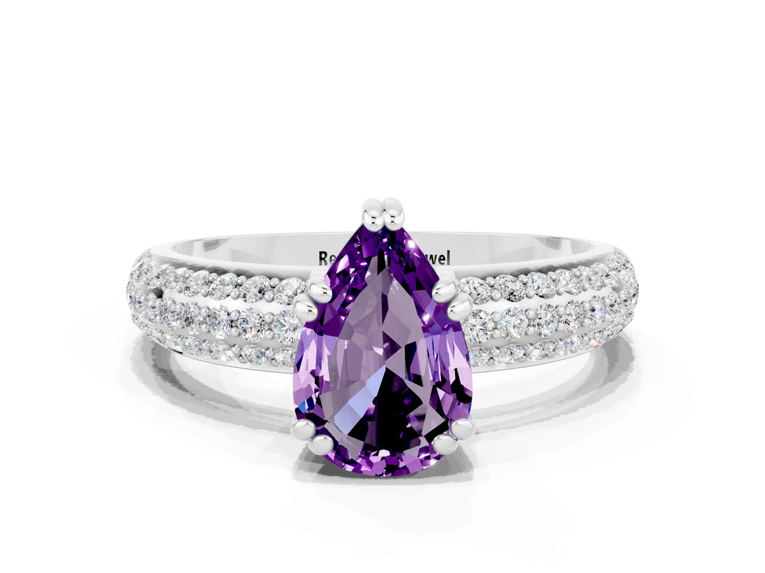 White gold Pear Cut Cut Pave Diamond Engagement Ring with Channel Set Band and Four-Prong Setting