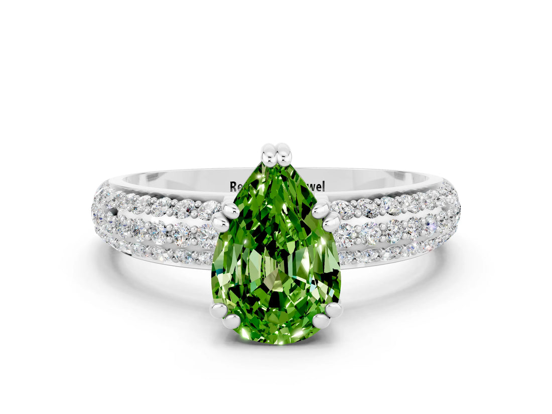 White gold Pear Cut Cut Pave Diamond Engagement Ring with Channel Set Band and Four-Prong Setting