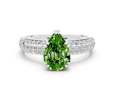 White gold Pear Cut Cut Pave Diamond Engagement Ring with Channel Set Band and Four-Prong Setting