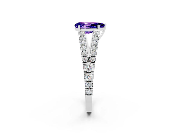 Silver Pear Cut Tanzanite Split Shank Engagement Ring with Round Pavé and Prong Setting