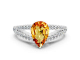 White gold Pear Cut Cut Split Shank Pave Diamond Engagement Ring with Four-Prong Setting