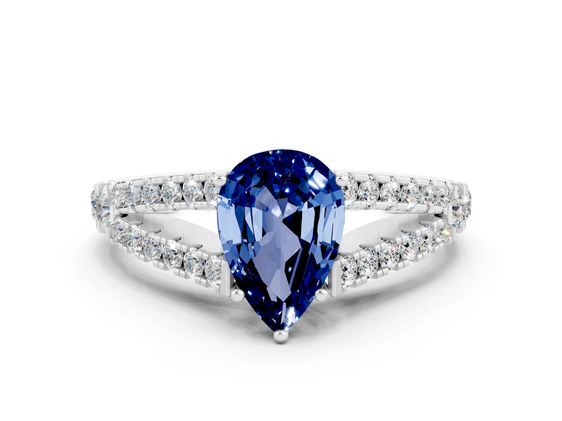White gold Pear Cut Cut Split Shank Pave Diamond Engagement Ring with Four-Prong Setting