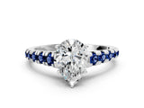 White gold Pear Cut Diamond Cathedral Solitaire Ring with Round with Blue Sapphire side stone Pavé Band_12