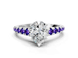 White gold Pear Cut Diamond Cathedral Solitaire Ring with Round with Tanzanite side stone Pavé Band