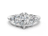 White gold Pear Cut Diamond Cluster Ring with Round Accent Stones and Prong Setting on a Classic Band_79