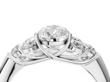 White gold Pear Cut Diamond Cluster Ring with Round Accent Stones and Prong Setting on a Classic Band_83