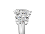 White gold Pear Cut Diamond Cluster Ring with Round Accent Stones and Prong Setting on a Classic Band_84