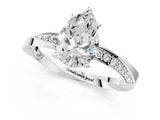 White gold Pear Cut Diamond Engagement Ring with Side Stone Accents and Four-Prong Setting_22