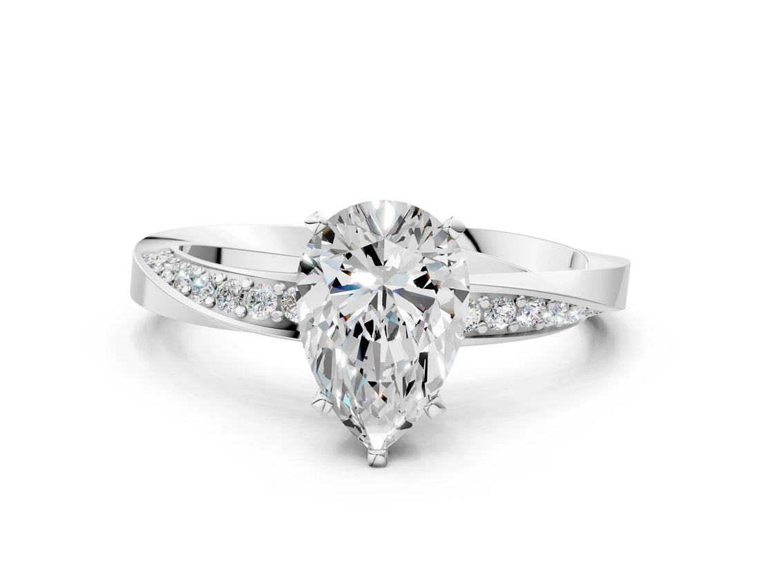 White gold Pear Cut Diamond Engagement Ring with Side Stone Accents and Four-Prong Setting_39