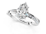 White gold Pear Cut Diamond Engagement Ring with Side Stone Accents and Four-Prong Setting_40