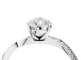 White gold Pear Cut Diamond Engagement Ring with Side Stone Accents and Four-Prong Setting_43
