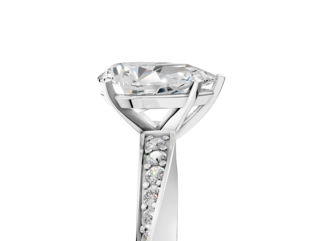 White gold Pear Cut Diamond Engagement Ring with Side Stone Accents and Four-Prong Setting_44