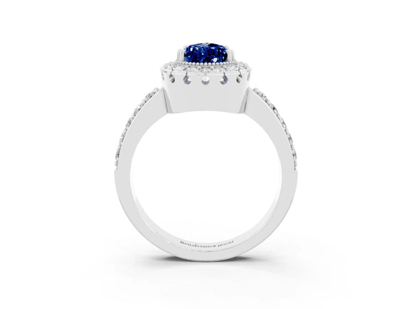 White gold Pear Cut Blue Sapphire Halo Ring with Pavé Band and Prong Setting