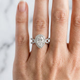 White gold Pear Cut Diamond Halo Ring with Split Shank Pavé Band and Prong Setting_85