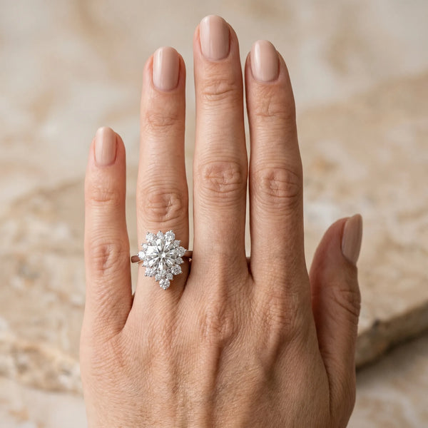 White gold Pear-Cut Diamond Halo Solitaire Ring with Round Brilliant Halo and Prong Setting