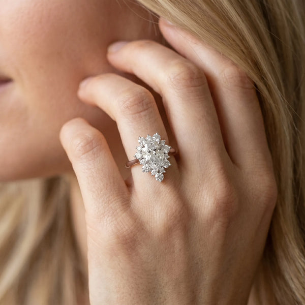 White gold Pear-Cut Diamond Halo Solitaire Ring with Round Brilliant Halo and Prong Setting