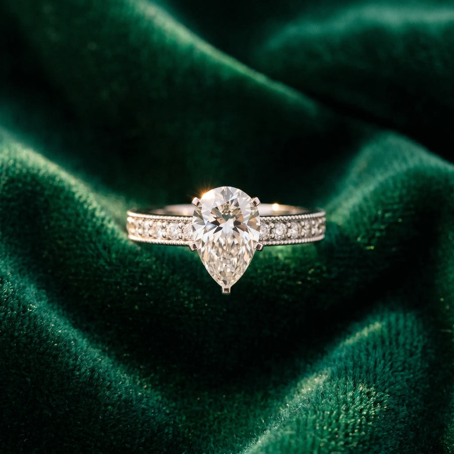White gold Pear Cut Diamond Milgrain Pavé Engagement Ring with Four-Prong Setting
