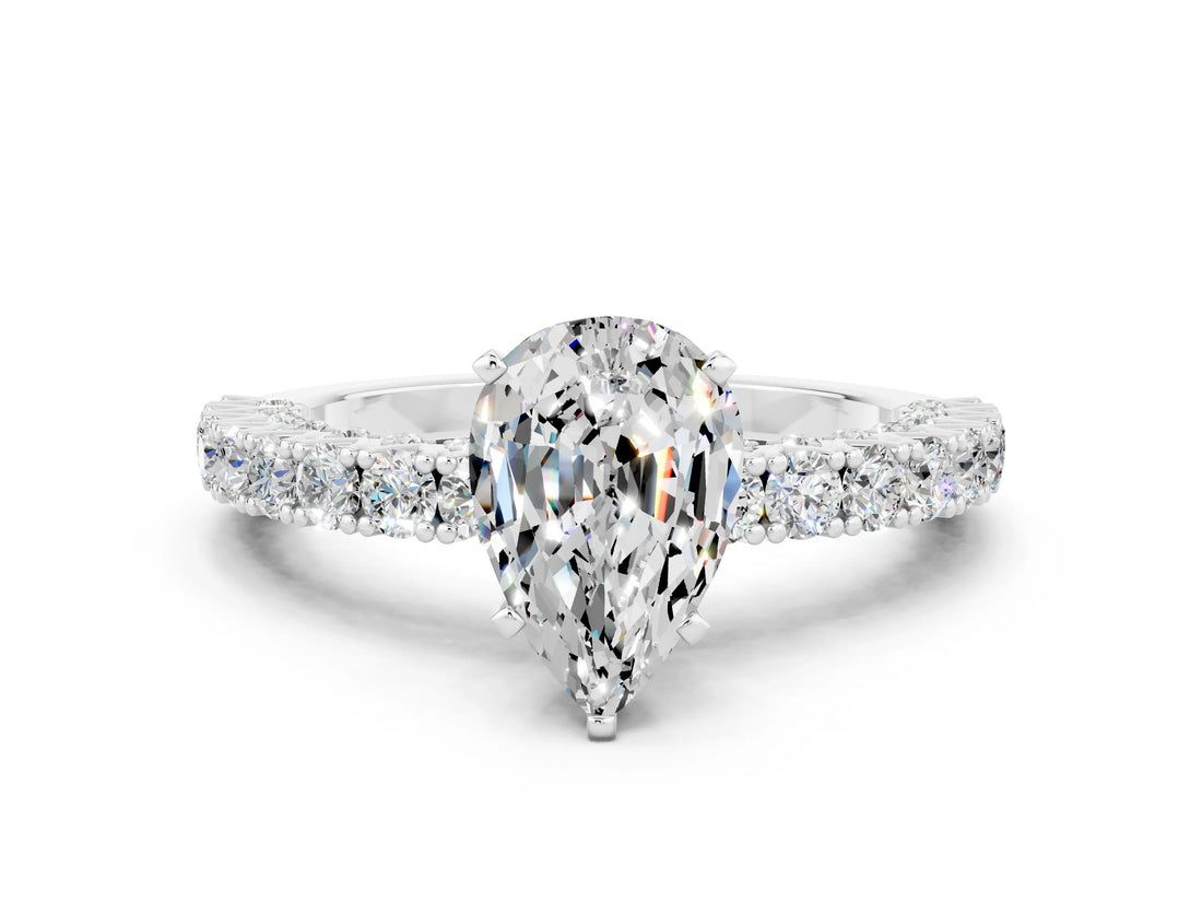 White gold Pear Cut Diamond Pavé Band Solitaire Ring with Prong Setting