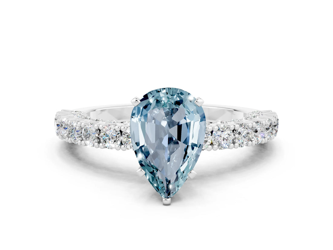 White gold Pear Cut Diamond Pavé Band Solitaire Ring with Prong Setting