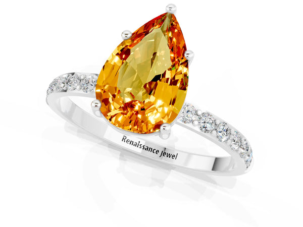 Platinum Pear Cut Citrine Solitaire Ring with Round Pavé Shoulders and Prong Setting