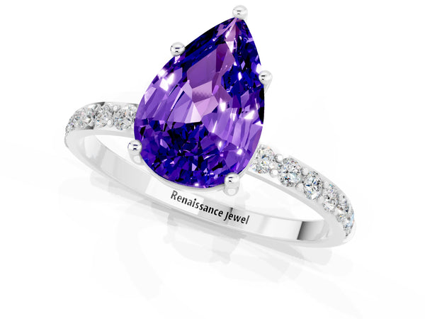 Silver Pear Cut Tanzanite Solitaire Ring with Round Pavé Shoulders and Prong Setting