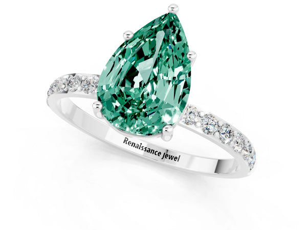 Silver Pear Cut Green Sapphire Solitaire Ring with Round Pavé Shoulders and Prong Setting