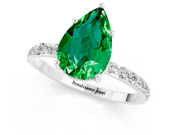 Platinum Pear Cut Emerald Solitaire Ring with Round Pavé Shoulders and Prong Setting