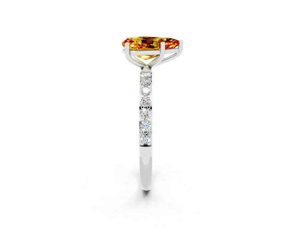 Platinum Pear Cut Citrine Solitaire Ring with Round Pavé Shoulders and Prong Setting