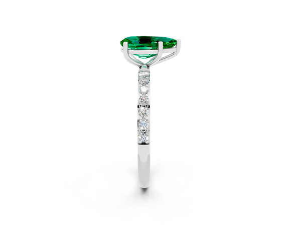 Platinum Pear Cut Emerald Solitaire Ring with Round Pavé Shoulders and Prong Setting
