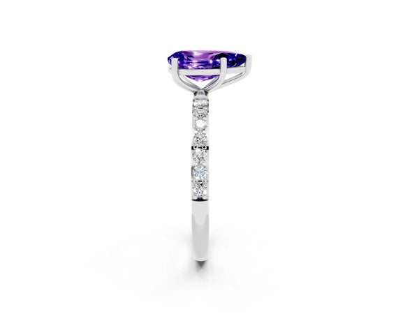 Silver Pear Cut Tanzanite Solitaire Ring with Round Pavé Shoulders and Prong Setting