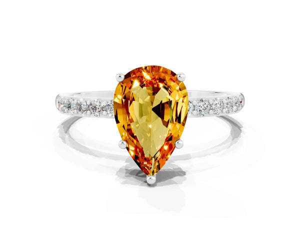 Platinum Pear Cut Citrine Solitaire Ring with Round Pavé Shoulders and Prong Setting